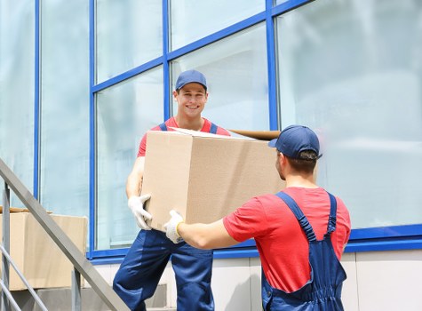 Furniture pick-up service removing a sofa in Finland