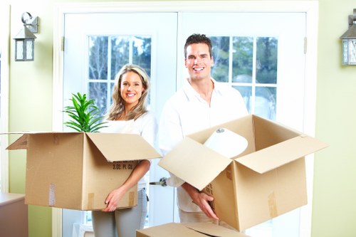 Professional movers handling furniture during house removals in Finland